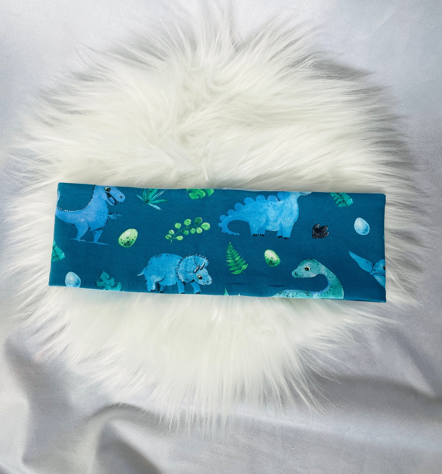 Stirnband blauer Dino