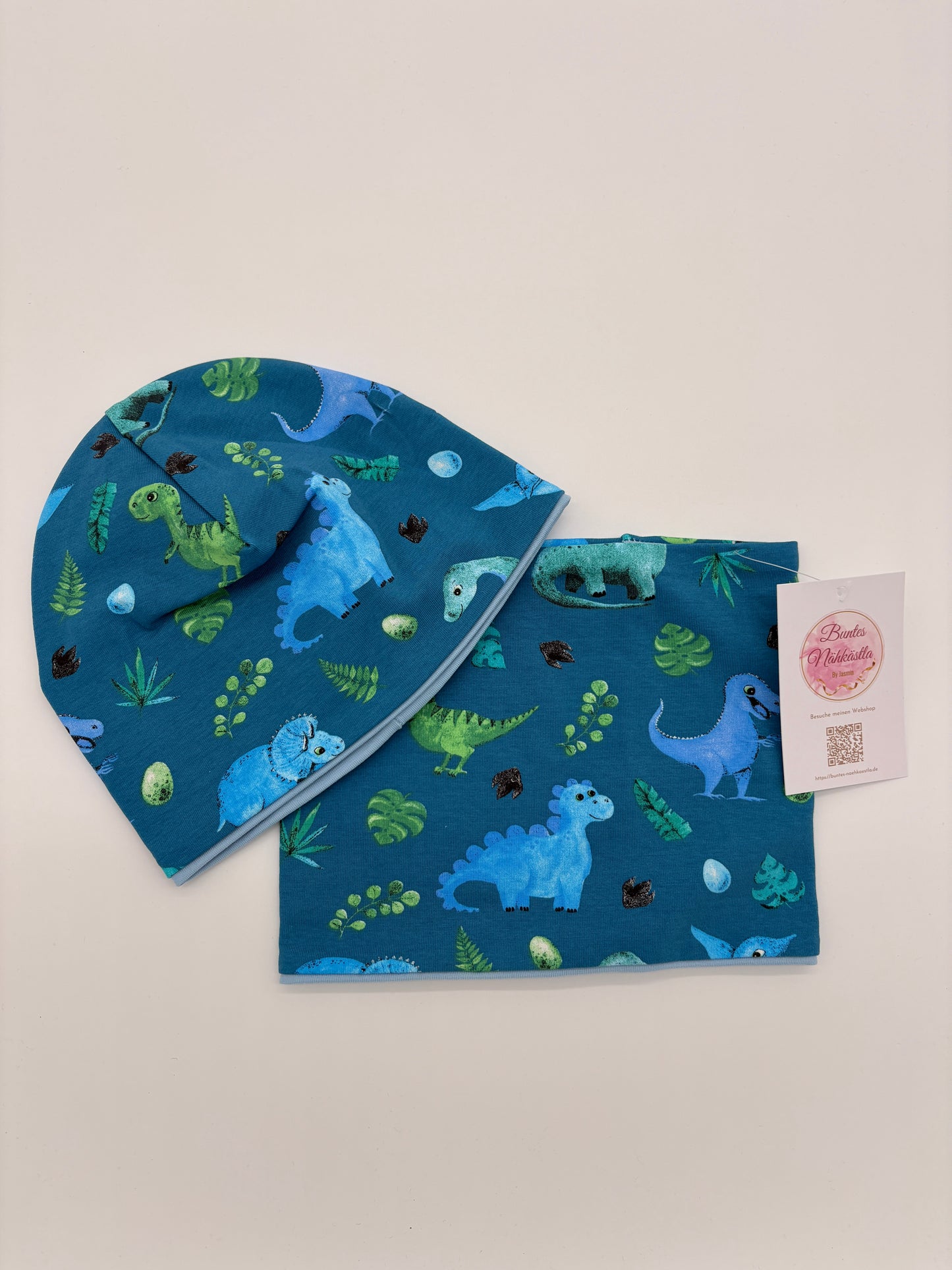 Mütze und Loop blauer Dino