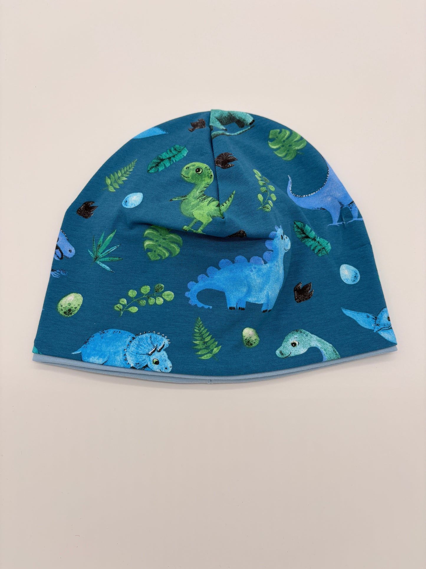 Mütze und Loop blauer Dino