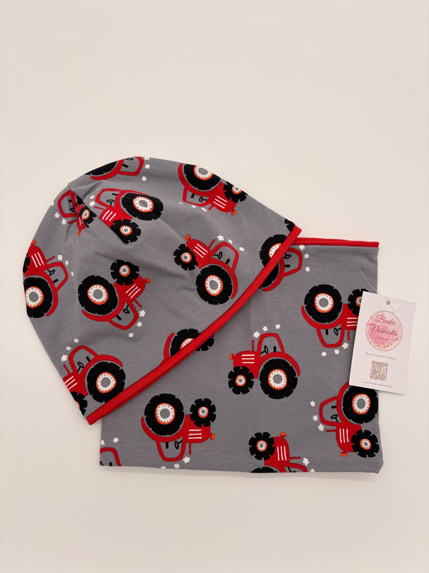 Mütze und Loop roter Traktor