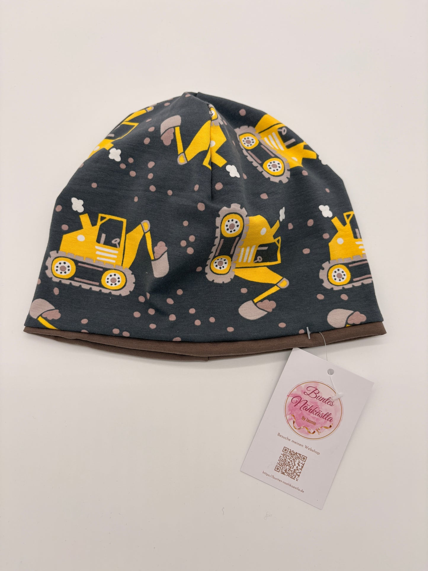 Mütze und Loop gelber Bagger